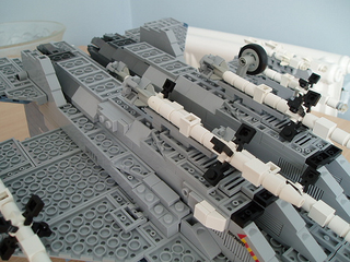 Illustration for article titled Giant LEGO B-1B Bomber Escorted by Fighters, Hawkeye Aircraft